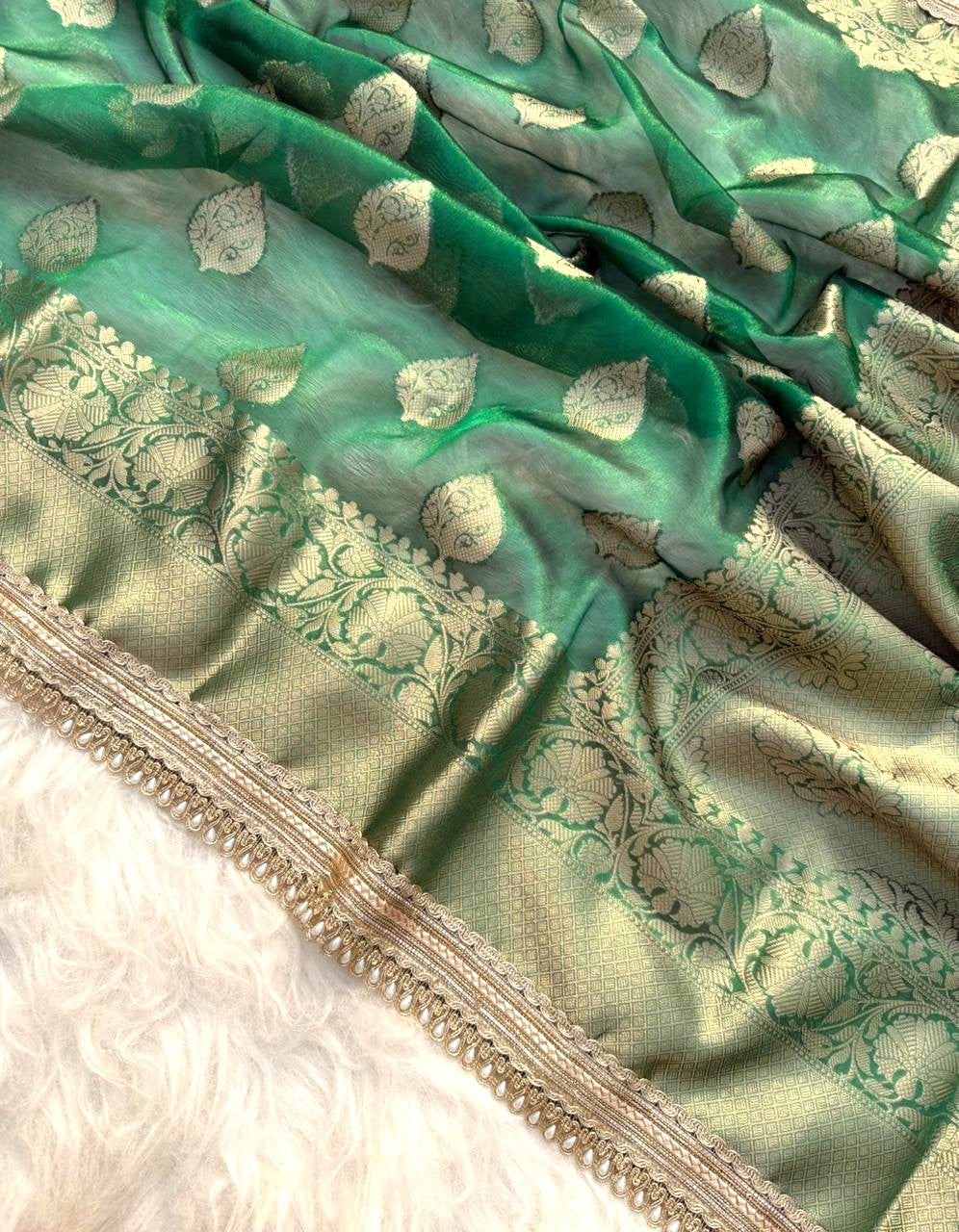 Green Color Banarasi Tissue Silk Saree With Lace Work Alna Apparels