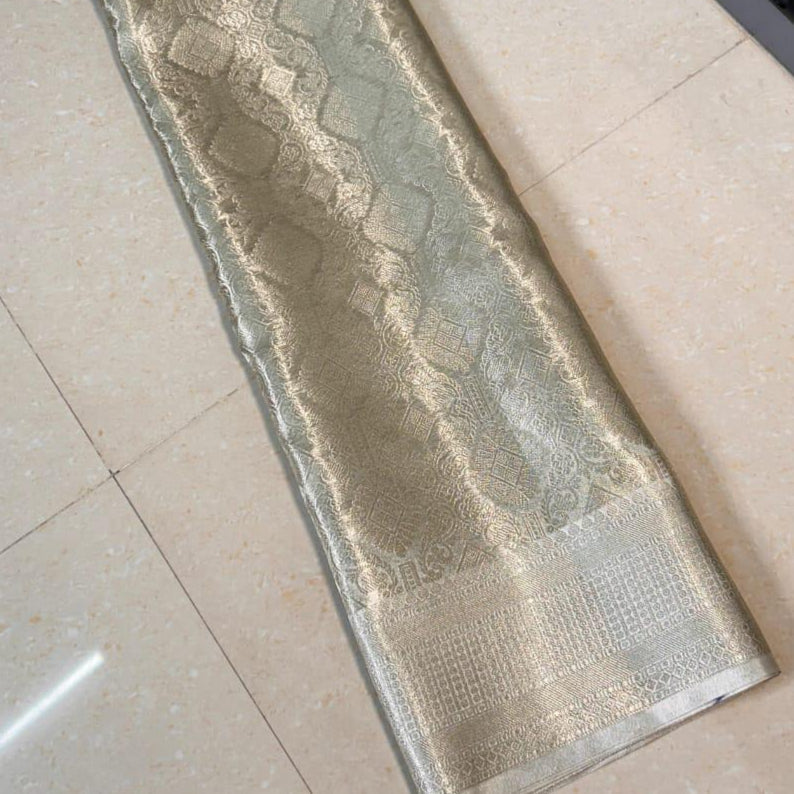 Nayantara inspired Silver Banarasi Tissue Silk Saree Alna Apparels